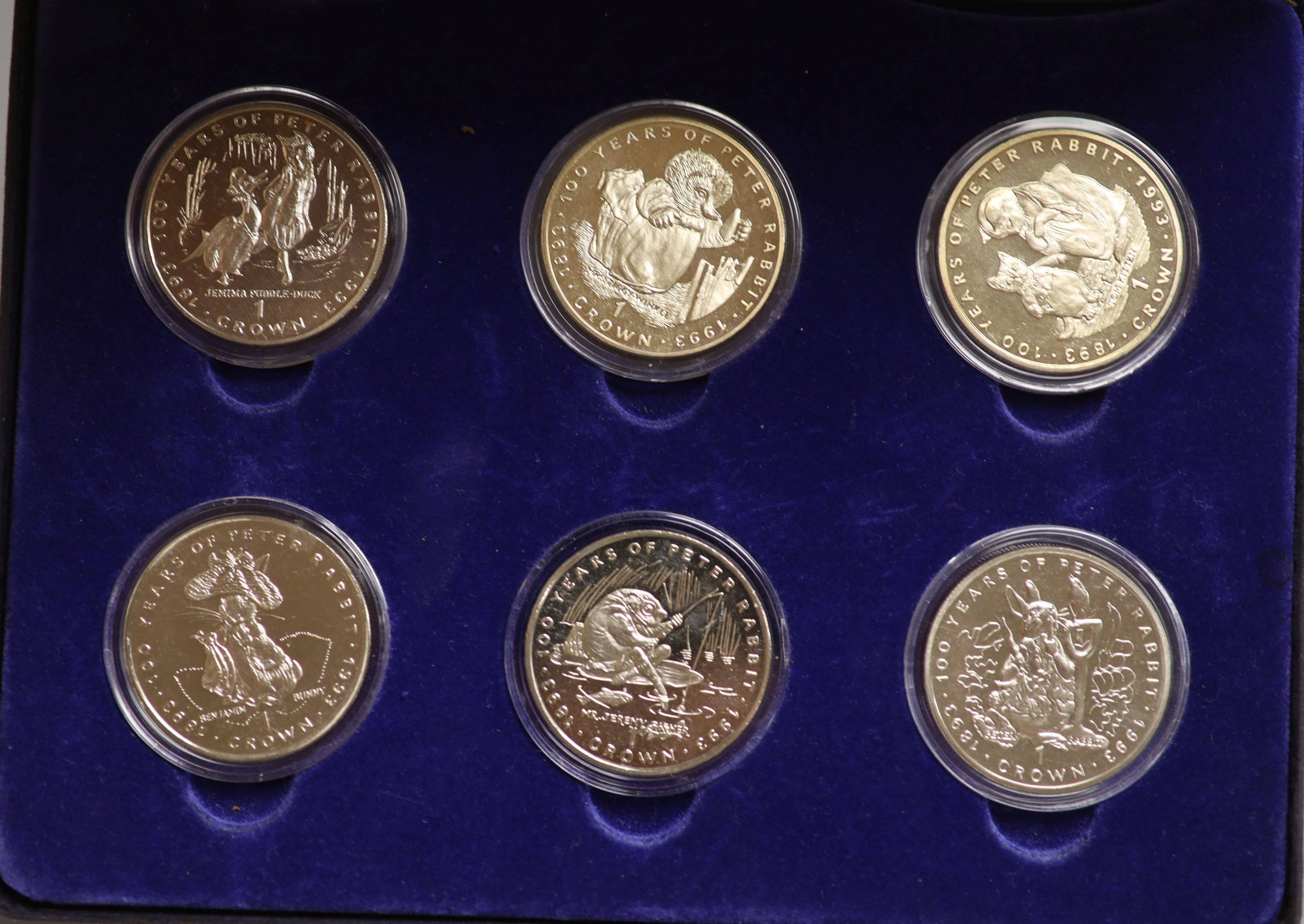 A Westminster 5 oz. proof silver concorde commemorative coin, 2003 and A Westminster the Beatrix Potter coin collection comprising six crowns 1993